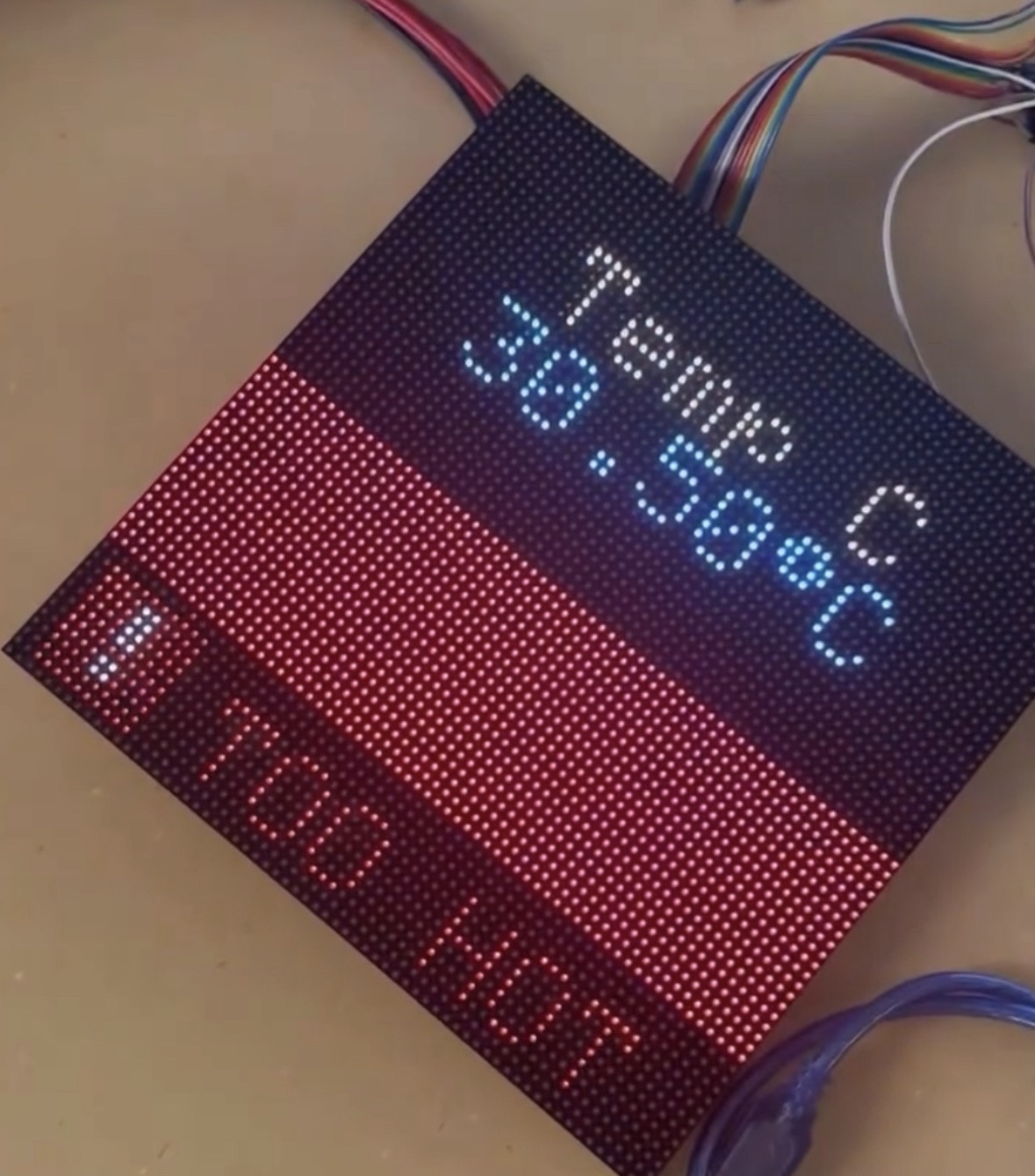 Close-up of RGB matrix displaying TOO HOT warning